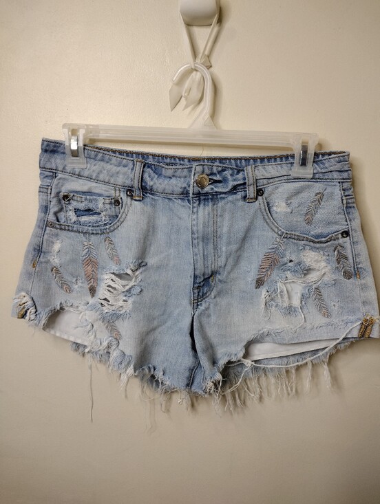 American Eagle Outfitters Pants - American Eagle 2016 Light Wash  Feather Embroidered Distressed Denim Booty Short